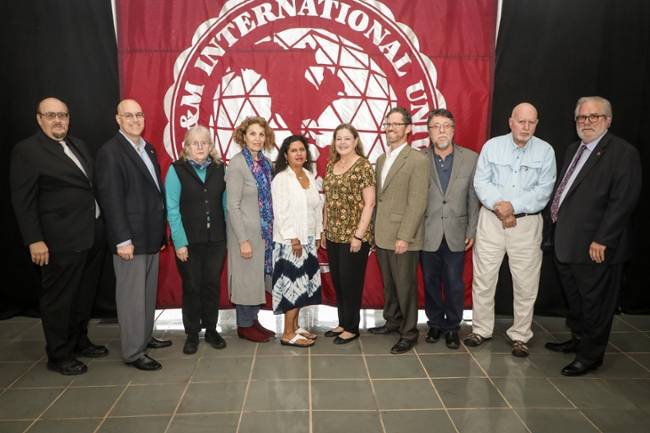 TAMIU faculty authors were celebrated with a special reception in the Sue and Radcliffe Killam Library.  Left to right, Dr. Pablo Arenaz, president;  Dr. John Kilburn, Dr. Judith Warner, Dr. Lola O. Norris, Dr. Mehnazz Monem,Dr. Diana Linn, Dr. John E. Dean, Dr. Robert W. Haynes, Dr. Jerry D. Thompson and Provost Dr. Tom Mitchell. 