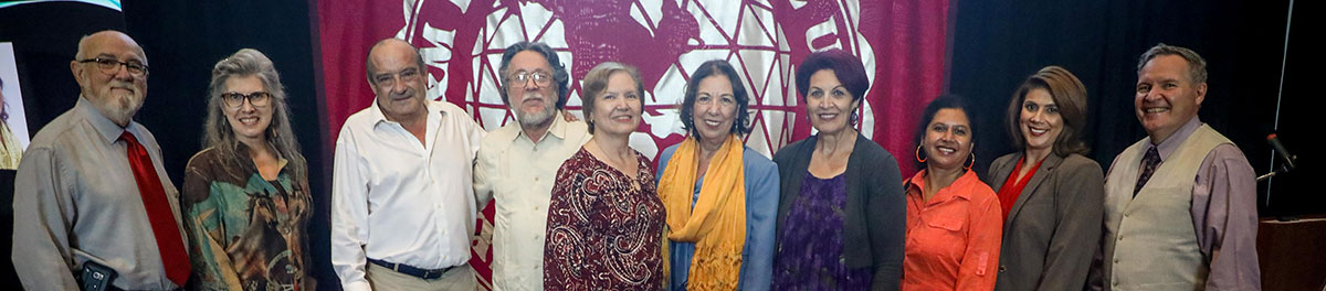 Dr. Cantu and other TAMIU employees smiling for a picture.