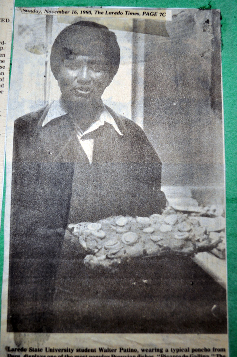 Walter Patino photographed with his homemade recipe for Spiced Chicken.