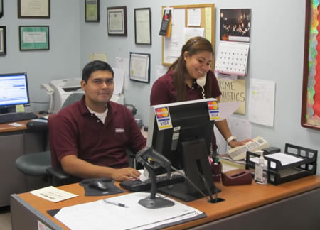 Student workers working the front office.