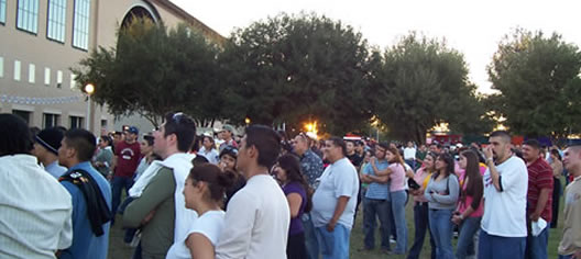the crowd listening to band