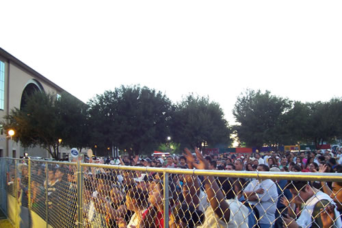 crowd gathers to listen to band