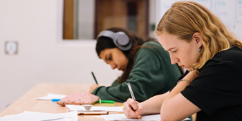 teacher in a classroom with students