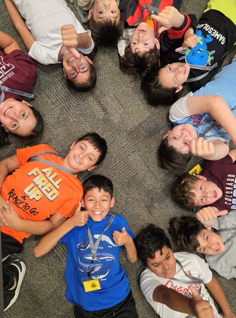 Dusty's Jr. Summer Camp Group of Children in a Circle