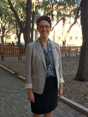 Dr. Klein on campus in front of Cowart Hall