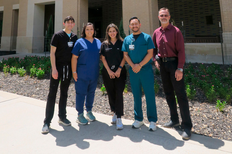 students outside of a building