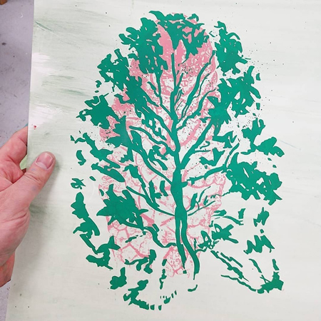 Green and Pink printing of zucchini leaves on white paper