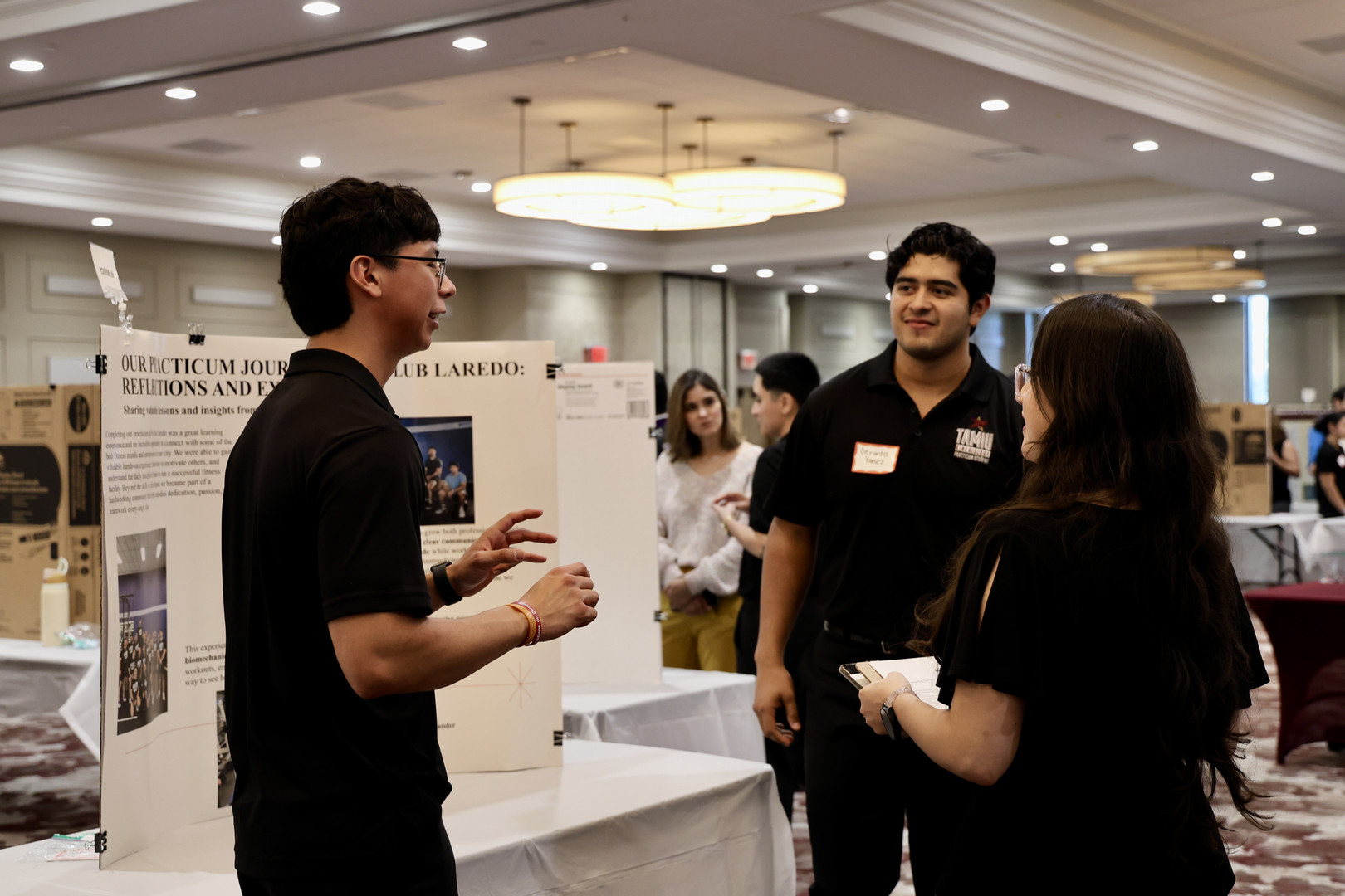 Student presenting a poster 