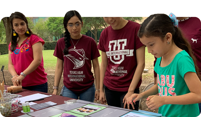 Children doing activites at Discover TAMIU