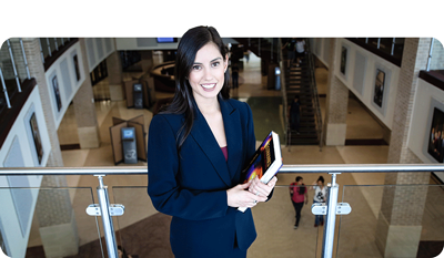 Graduate Stands with a Book