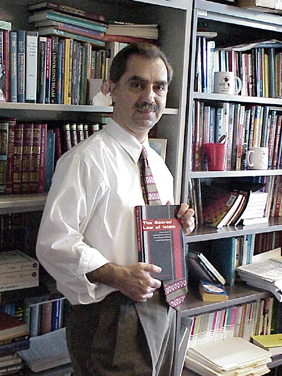 Dr. Kusha with his new book