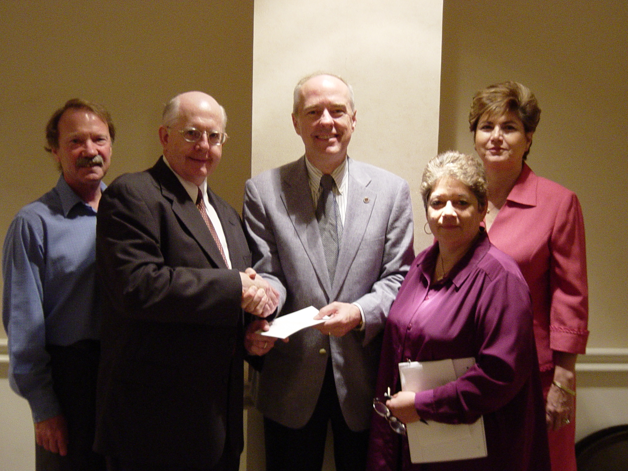 Laredo Manufacturers’ Association president Larry Shaw (second from left), presents a $4,000 gift to Texas A&M International University president Dr. Ray Keck (center). The gift will be used for scholarships and programs at TAMIU. To date, the LMA has provided approximately $200,000 in scholarship funds to TAMIU. Also pictured are Texas Center director Dr. Michael Patrick (far left), LMA scholarship chair D.J. Utterback (second from right) and TAMIU vice president for Institutional Advancement Candy Hein (far right).