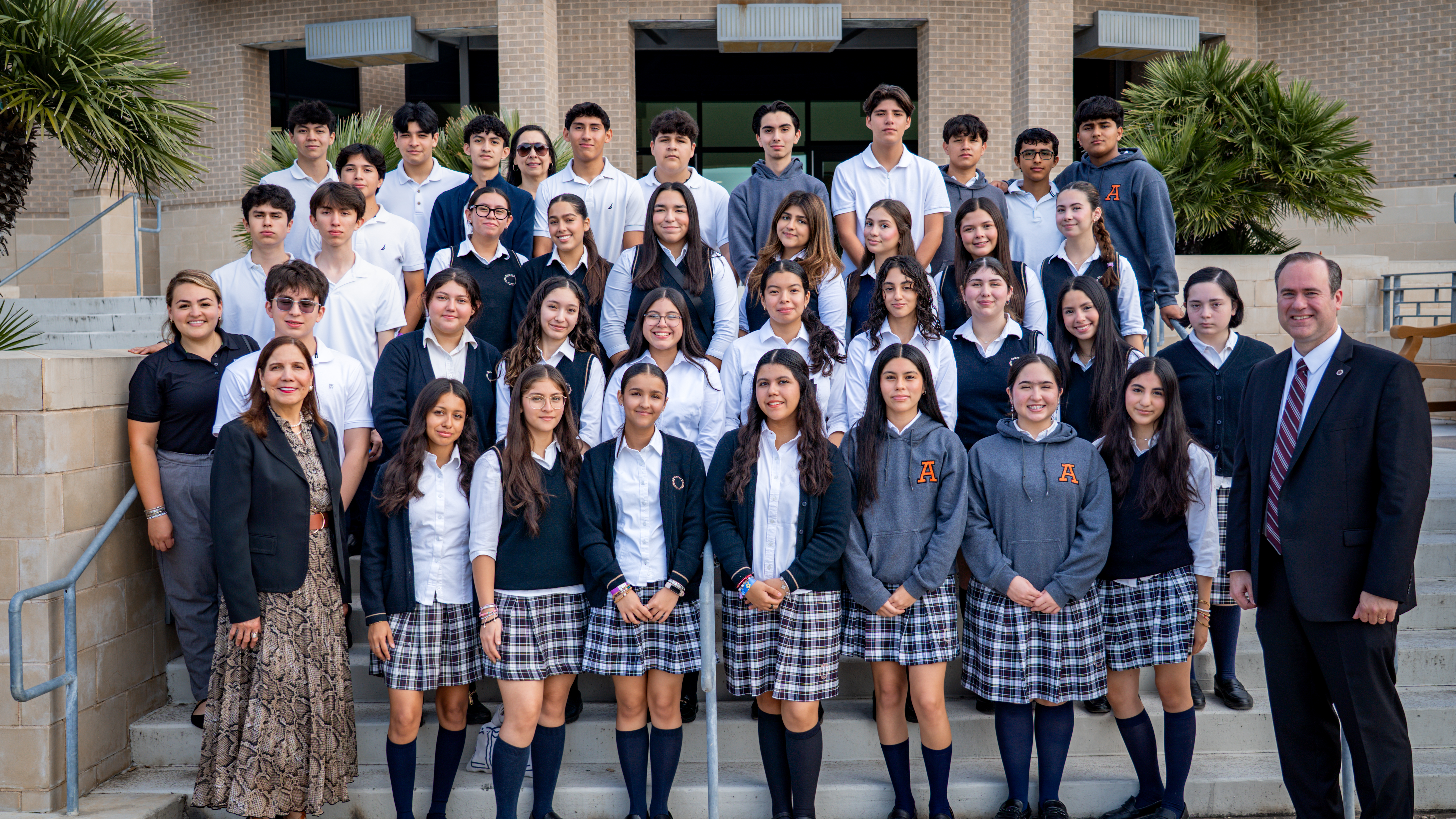 Irish International School students, administration stand together with TAMIU campus administration.