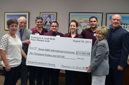 oining student scholarship recipients are, left, to right: Nora M. Leal, Dr. Francisco Leal; Gilsa Diaz, senior nursing student; Herman Castillo, senior; Karen Valadez, junior; John Saucedo, junior; Dr. Glenda Walker, TAMIU dean, College of Nursing and Health Sciences, and TAMIU president Dr. Ray Keck.