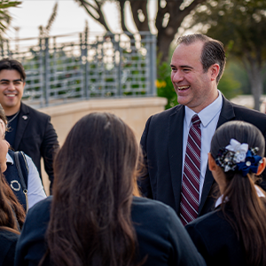 Dr. Maynard Laughing with Students