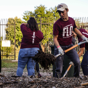 Student with a Shovel During Make A Difference Day