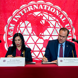 Dr. Julie Bazán, MRGBAHEC executive director, and TAMIU President Dr. Christopher Maynard and signed the MOU.