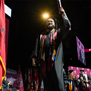 TAMIU Graduate Walking the Stage