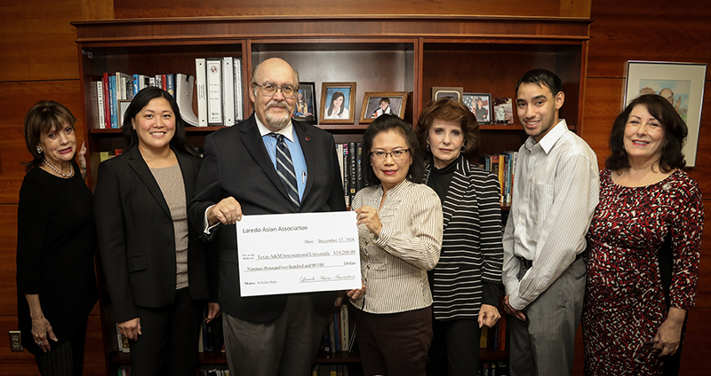  Pictured left to right are LAA members Toni Vela and Yu-Hsien Huang; Dr. Pablo Arenaz, TAMIU president; LAA member and TAMIU Distinguished Alumnus Gina Mejia (’87); LAA member Sylvia Ramos, TAMIU student Daniel Rosales, and TAMIU vice president for Institutional Advancement, Rosanne Palacios.