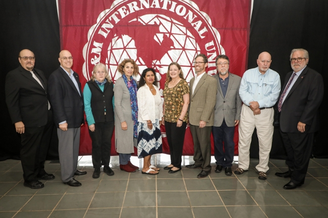 TAMIU faculty authors were celebrated with a special reception in the Sue and Radcliffe Killam Library. Left to right, Dr. Pablo Arenaz, president; Dr. John Kilburn, Dr. Judith A. Warner, Dr. Lola O. Norris, Dr. Mehnaaz Momen, Dr. Diana Linn, Dr. John E. Dean, Dr. Robert W. Haynes, Dr. Jerry D. Thompson and Provost Dr. Tom Mitchell.