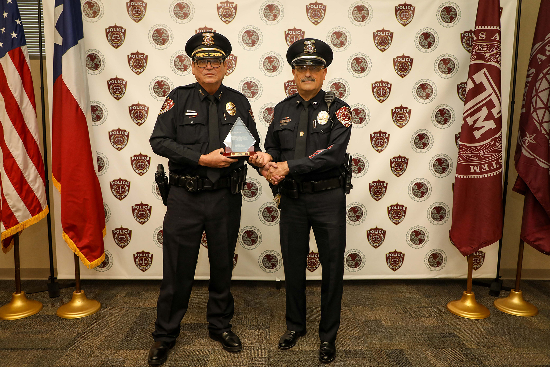 Chief San Miguel and Retiree Roel González