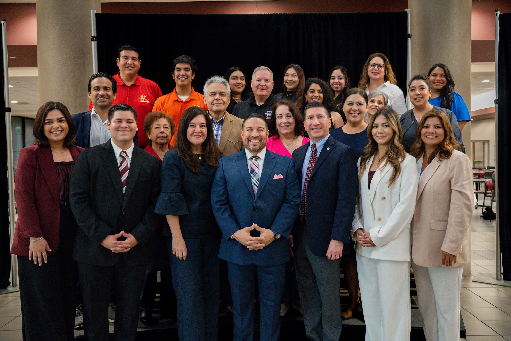 University leader and community members stand together to celebrate a partnership between TAMIU and the STFB
