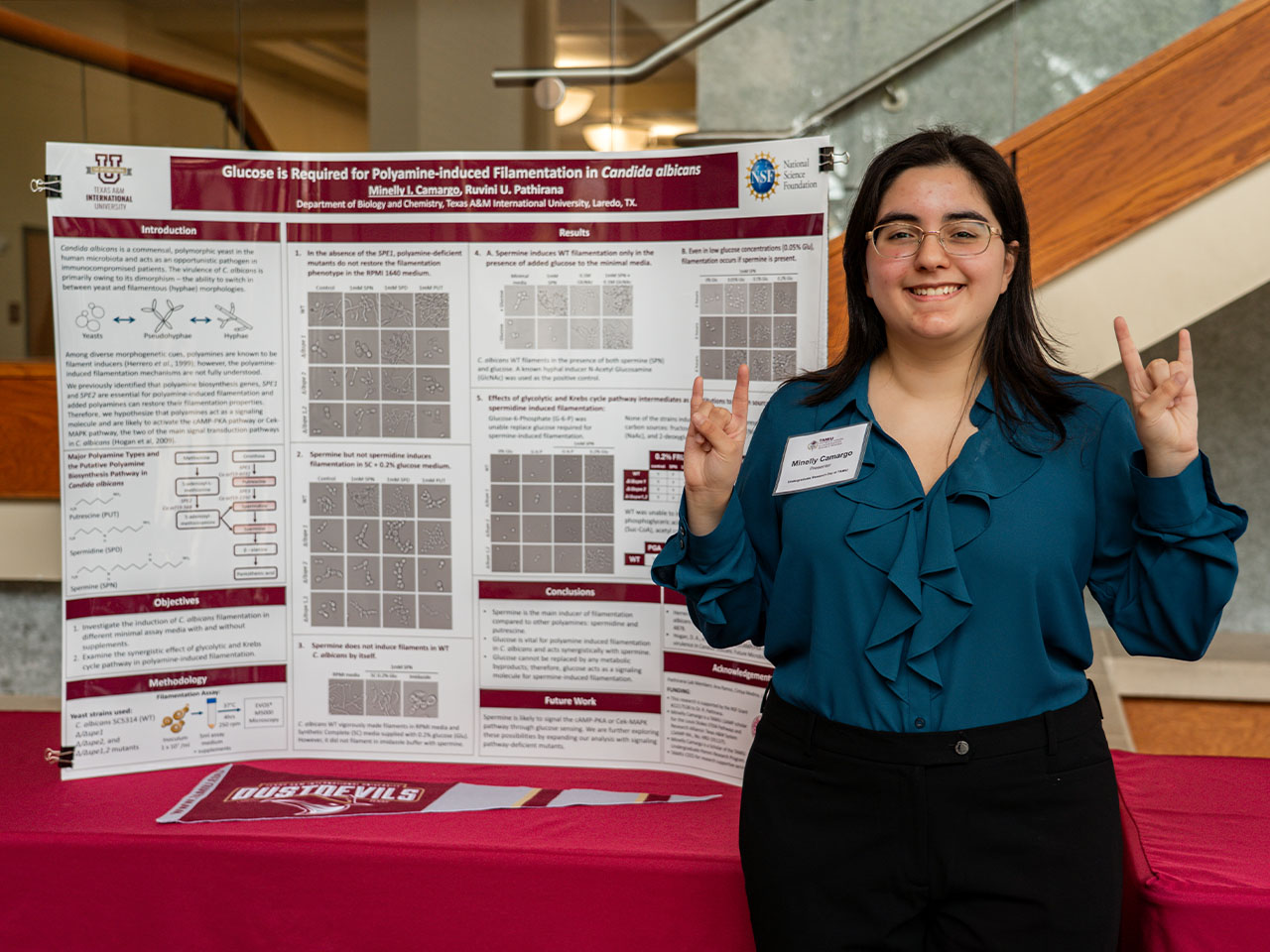 Student presenting at TAMIU's Undergraduate Research Fair