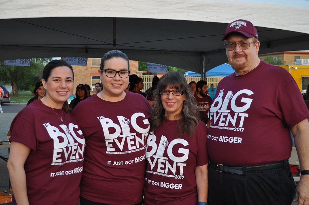 Dr. Arenaz and Faculty posing during the Big Event