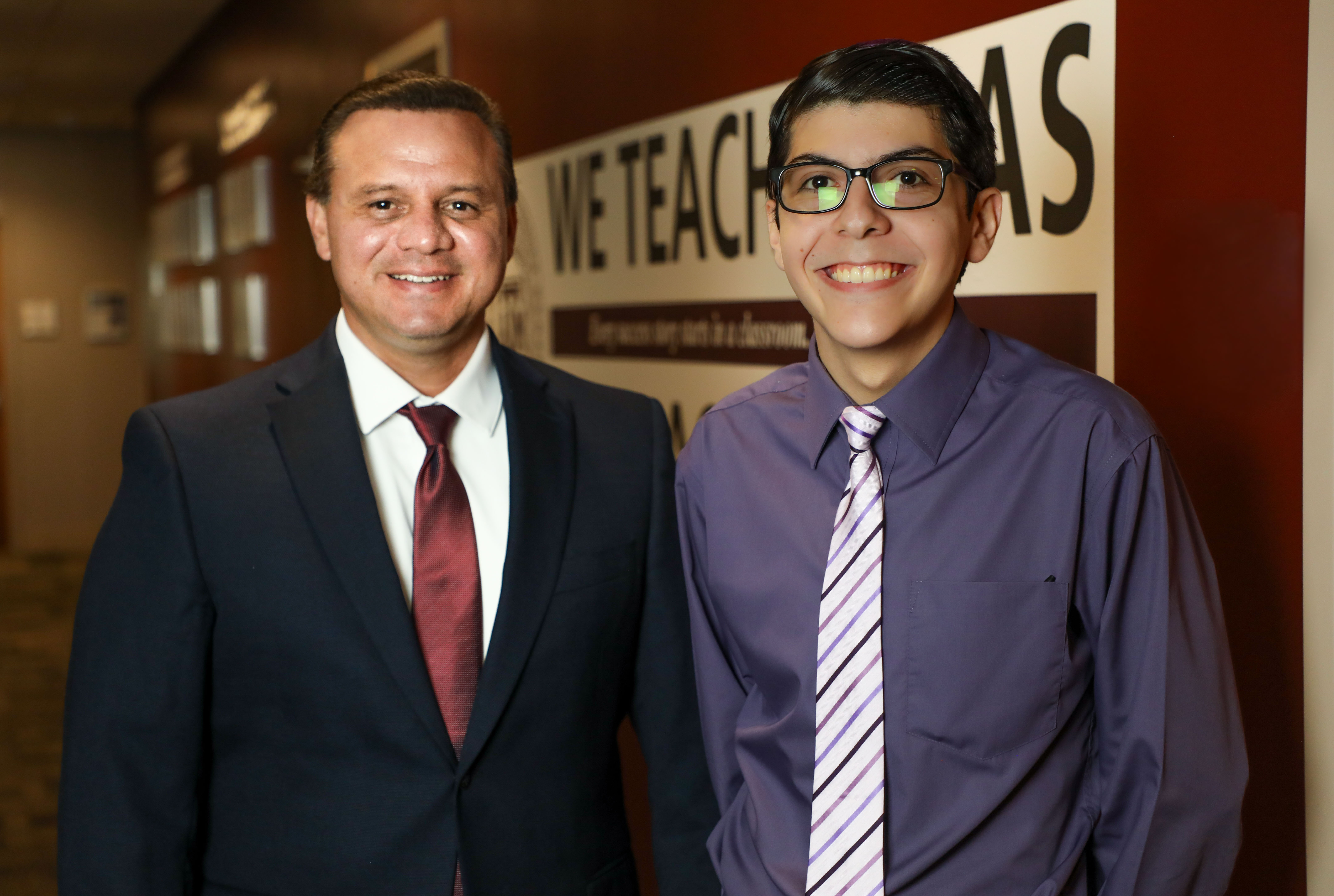 Dr. Jesse Salazar, College of Education assistant professional and student Alan Villarreal 