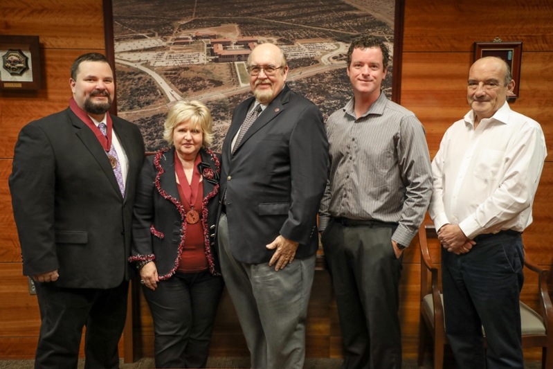 Texas A&M International University (TAMIU) recently recognized five professors for their dedication to education. TAMIU president Dr. Pablo Arenaz, third from left, congratulates the recipients—TAMIU associate professor of Marketing Dr. Rob Evans, TAMIU College of Nursing and Health Sciences dean Dr. Glenda Walker, TAMIU assistant professor of English Jonathan Murphy, and TAMIU Regents Professor of English Dr. Manuel Broncano. Not pictured is Dr. Frances Bernat, professor, criminal justice, College of Arts and Sciences, department of Social Sciences, named the University’s Scholar of the Year.