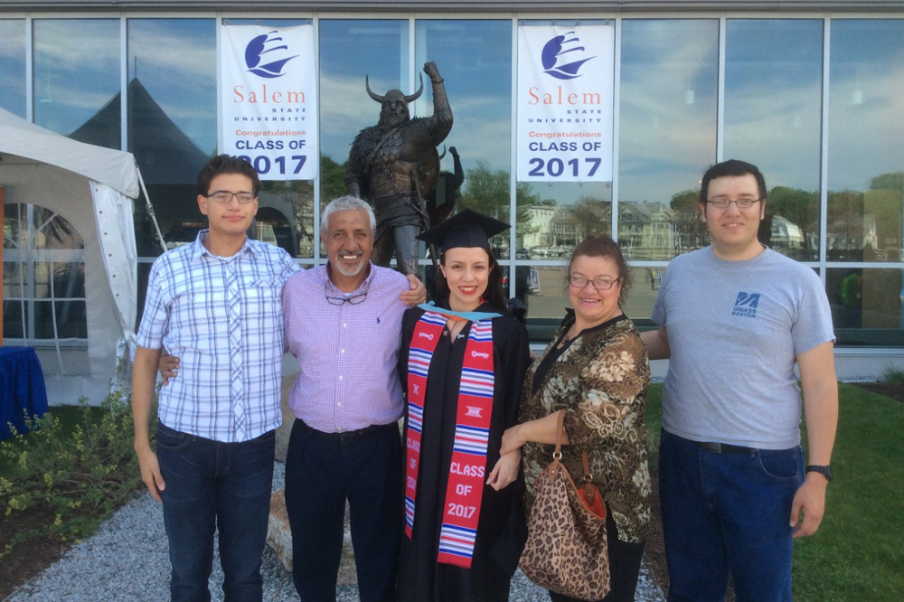 Lopez in a family photo during graduation.