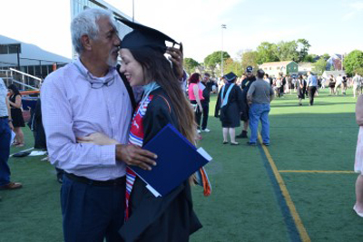 Lorissa Cortez with her father, Paul Cortez, at her graduation from Baylor University.