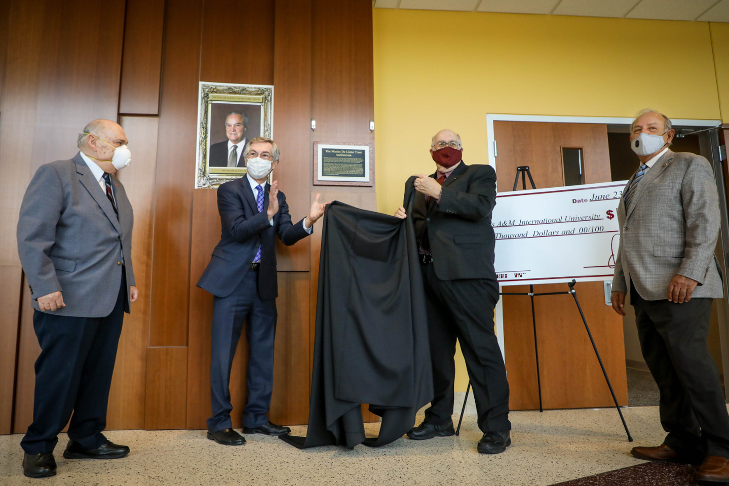 Celebrating the De Llano Charitable Trust's generous gift are (L to R)  Larry Norton, Trustee; Doug Howland, chairman of the Trust Committee; Dr. Pablo Arenaz, TAMIU president and Rudy Miles, Trustee.