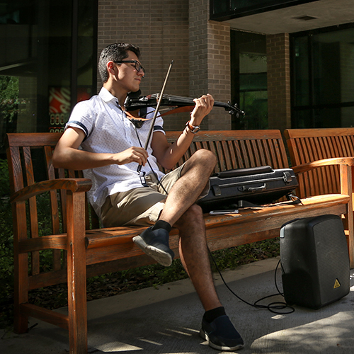 Student playing the violin