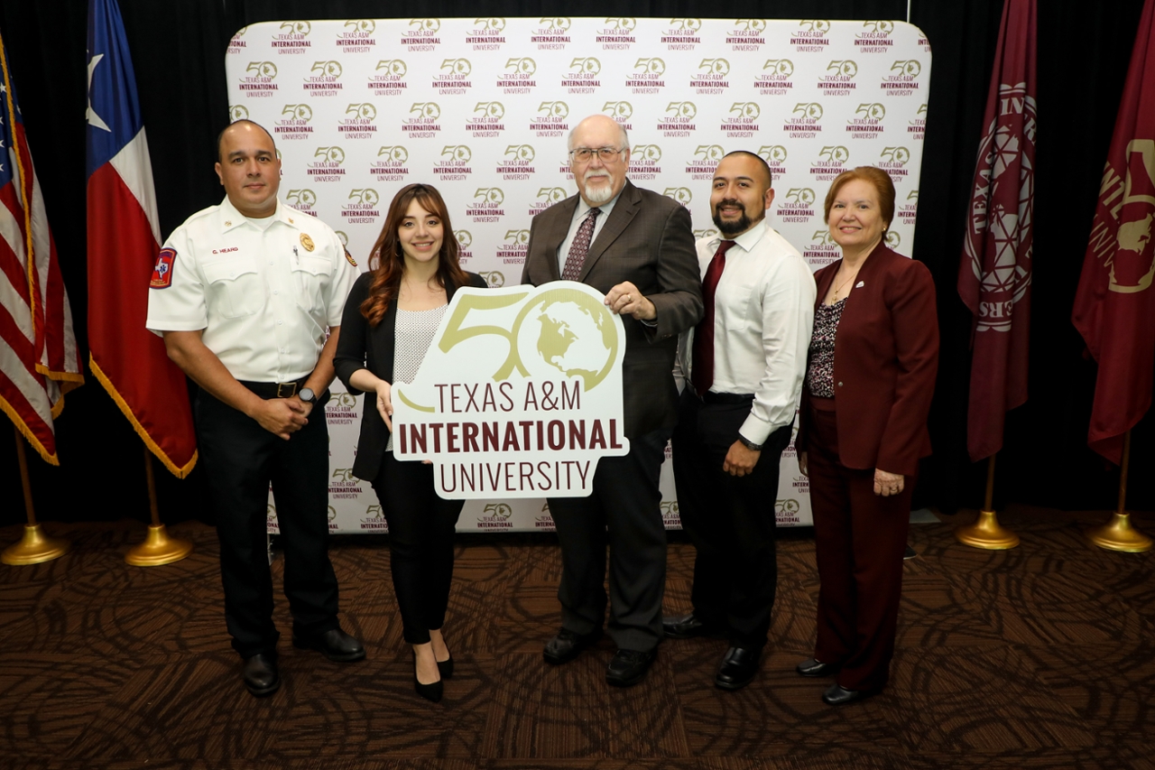 Recipients of Alumni Rising Star Award with Dr. Pablo Arenaz