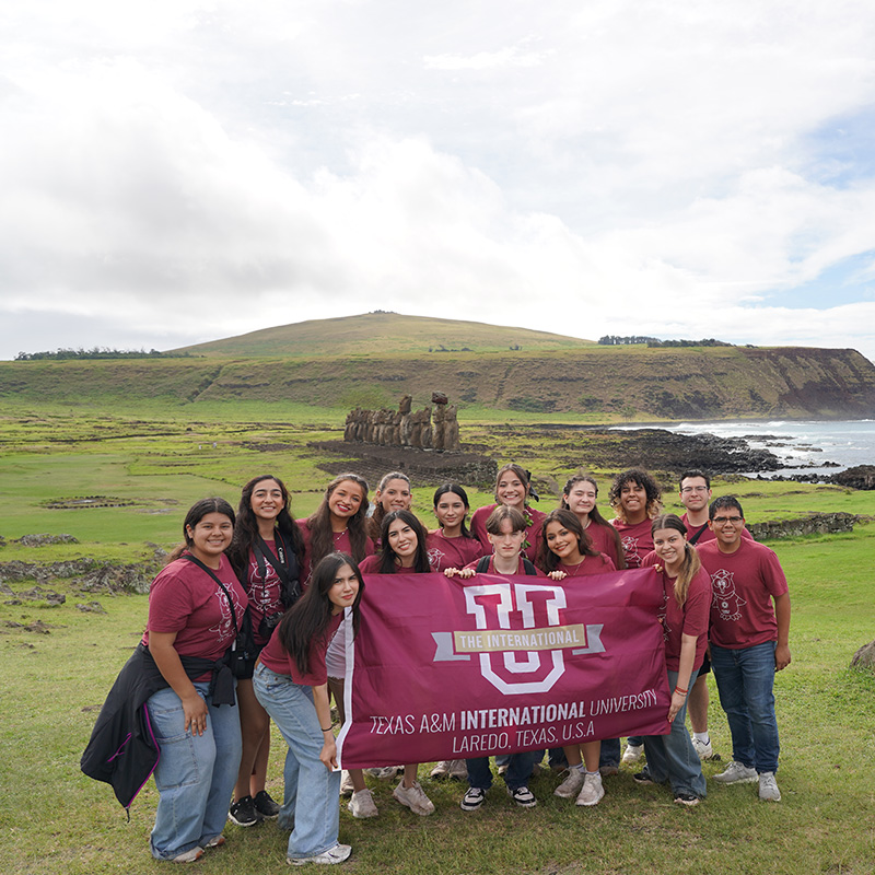 TAMIU Students Holding Banner