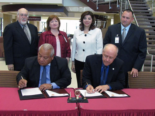 Pictured front, left to right, are Dr. Juan L. Maldonado, president, LCC and Dr. Ray M. Keck, president, TAMIU. At back, left to right, Dr. Pablo Arenaz, TAMIU provost and vice president for academic affairs; Dr. Dianna Miller, LCC vice president for instruction; Dr. Minita Ramirez, TAMIU vice president for Student Success and Dr. Vincent R. Solis, LCC vice president for student services.