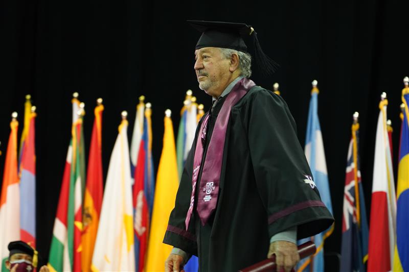 Graduating Student Walking