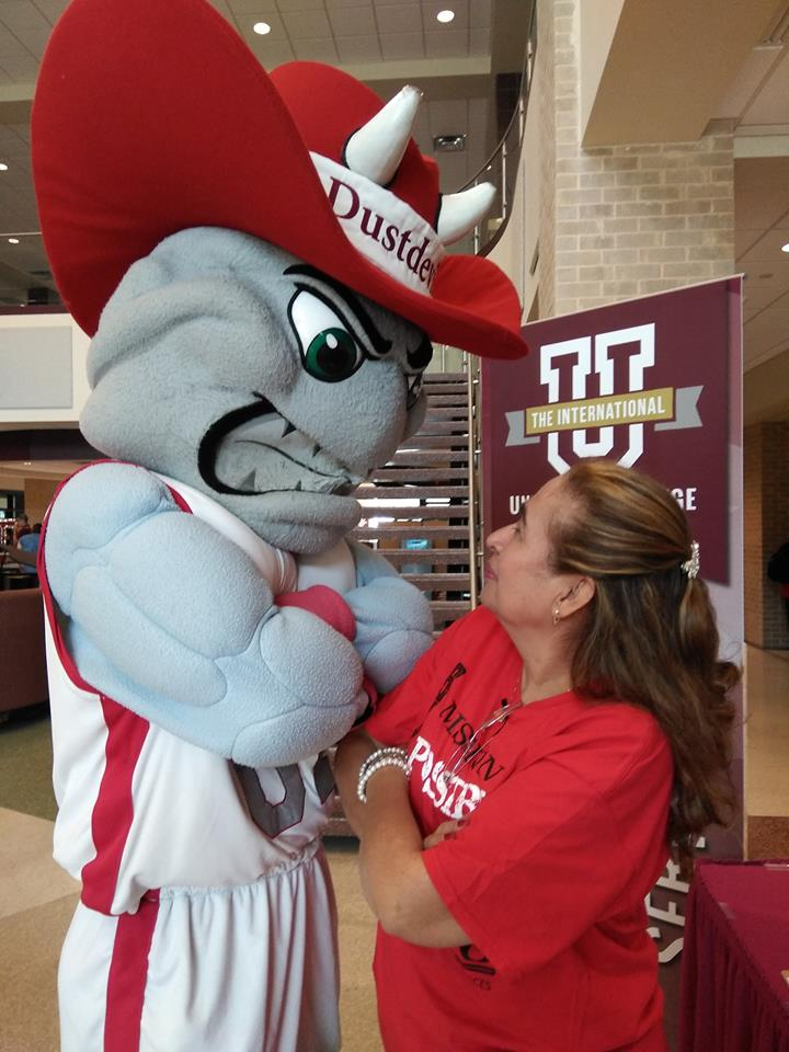 Staff member in a stare down with Dusty Mascot