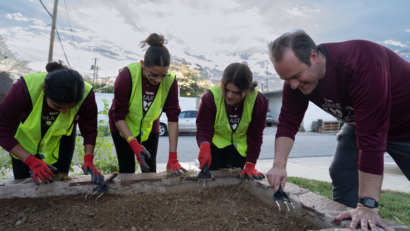 Volunteers gardening during Make A Difference Day