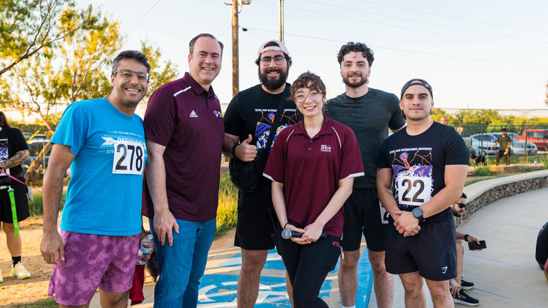 Dr. Maynard and Zombie Run participants before the Zombie Run 2025 event