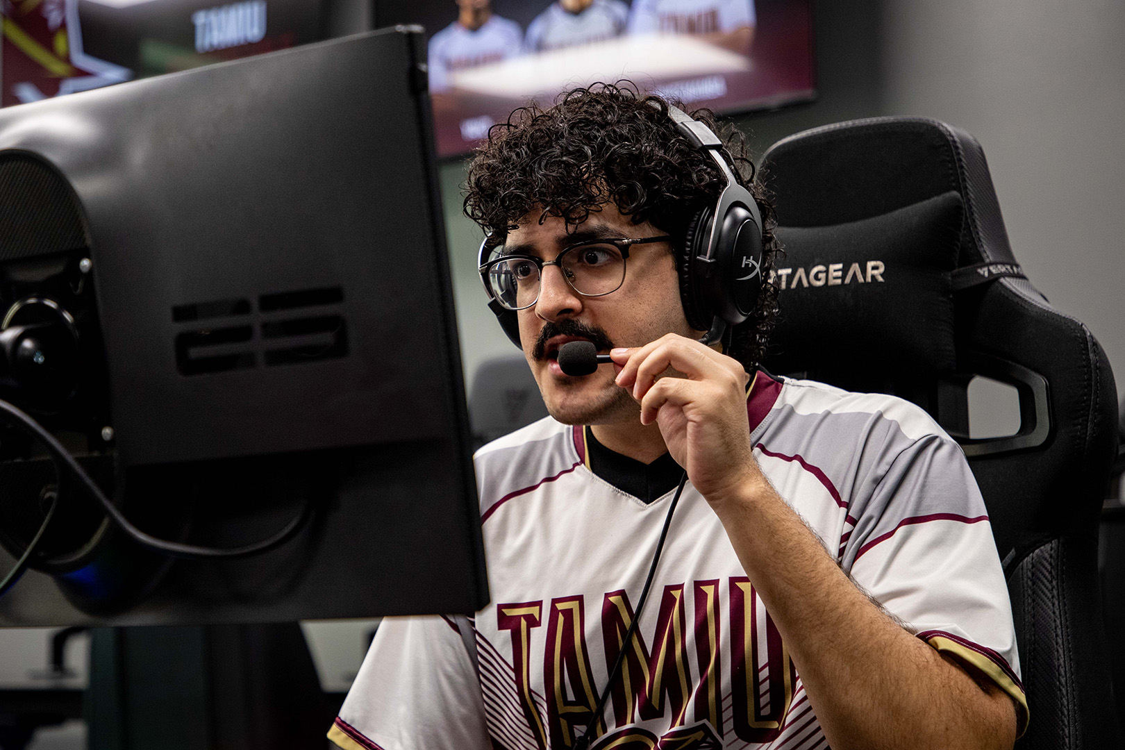 Esports Member with Game in Background