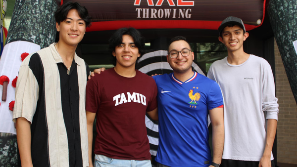 Students standing next to each other for a picture