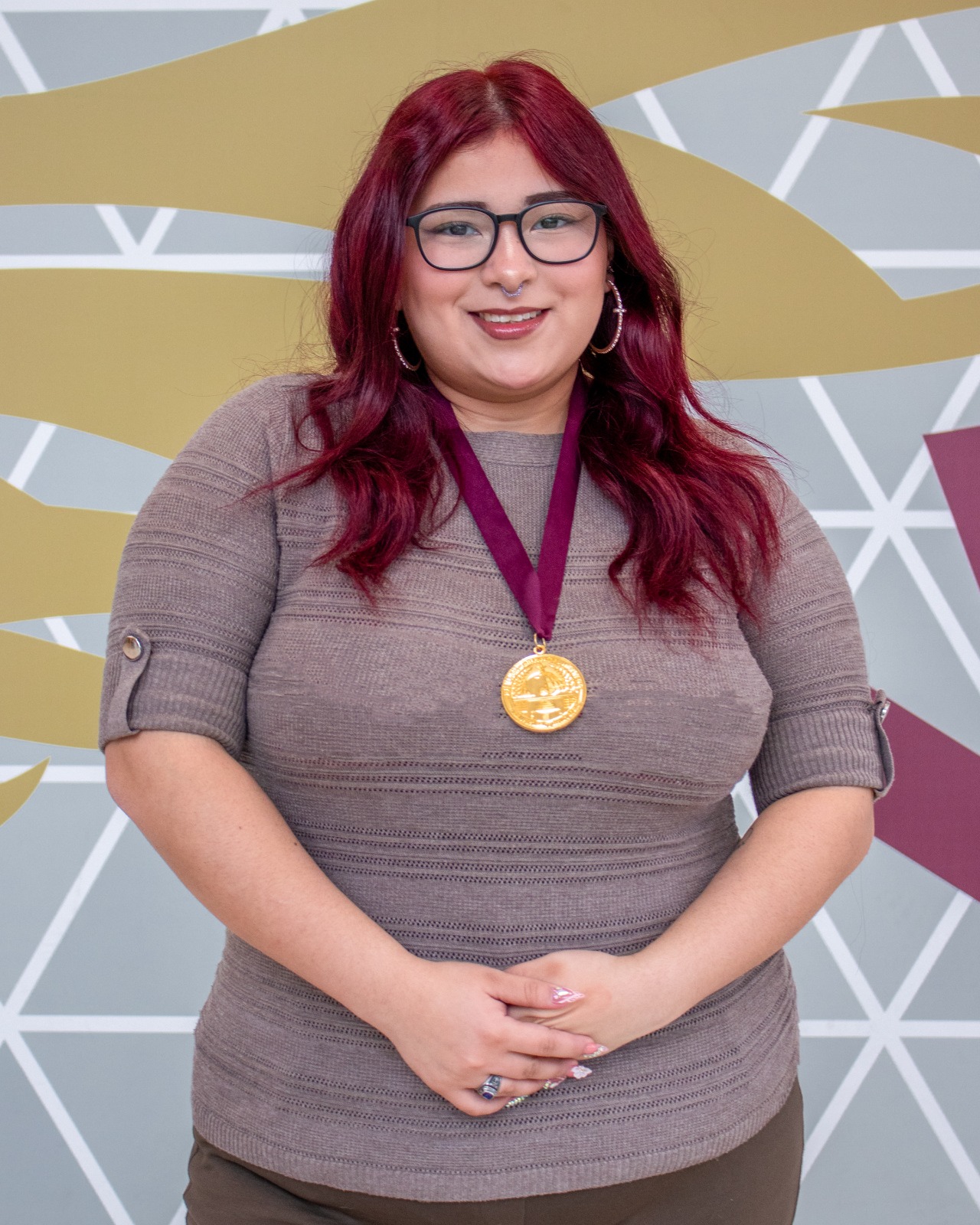 Zoe Garza TAMIU President's Service Award Medal