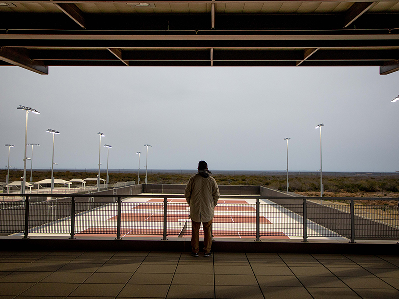 Person in Court at Night