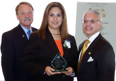 Angelica P. Cantu presented award by Dr. J. Michael Patrick and Mr. Tony Alvarez