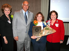 Sandra Cavazos, Bobby Santos and Linda Flores present UISD School Nurse of the Year to Irene Rosales of Nye Elementary