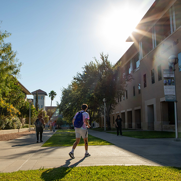 Students Walking Through Campus